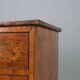 Neoclassical commode in walnut and burl.