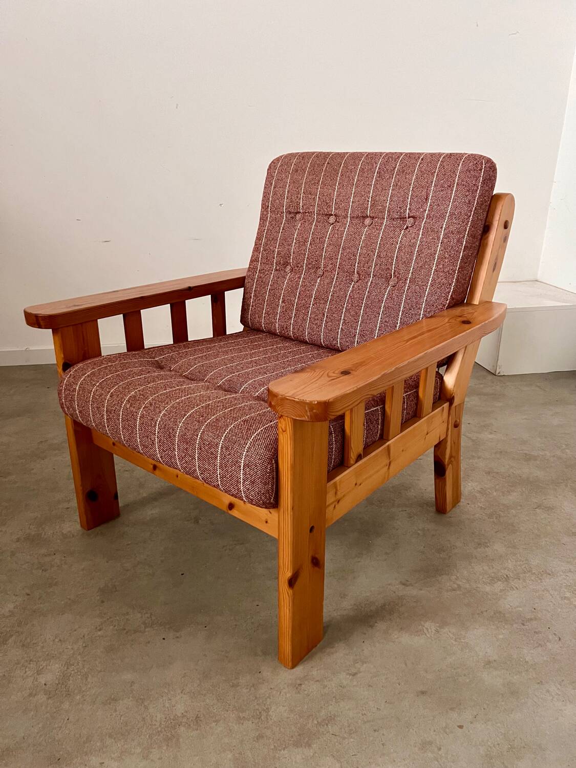 Old vintage Scandinavian design pine armchair from the 70s