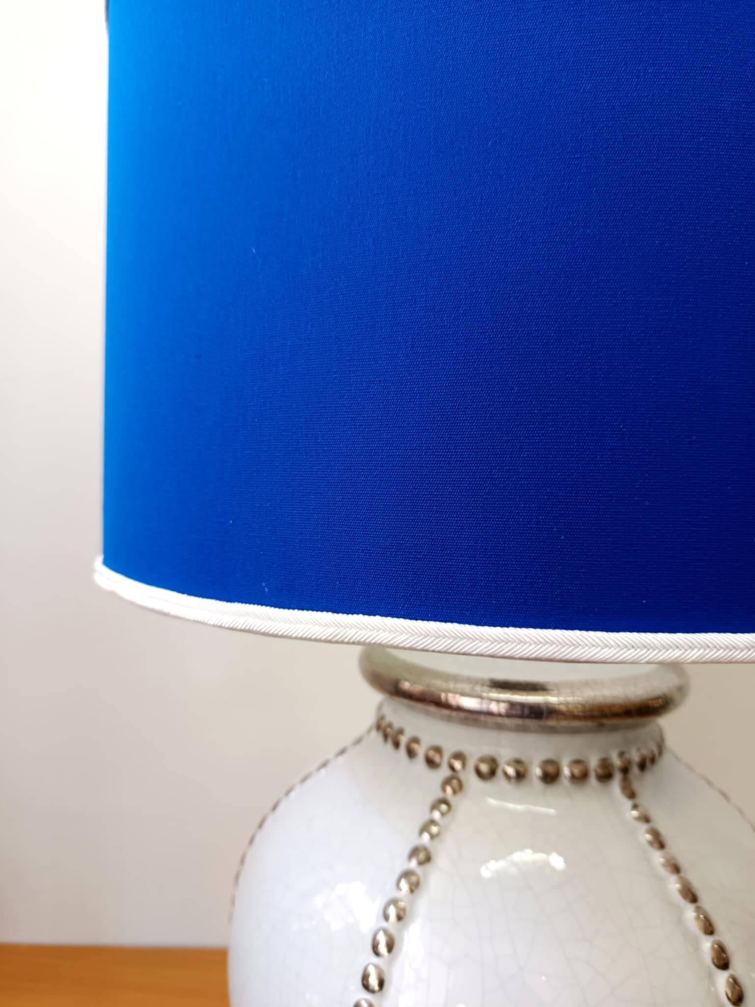 Longwy earthenware lamp and Klein blue lampshade