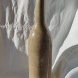 Vintage enamelled stoneware bottle