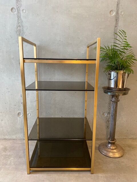 Golden brass and glass shelves