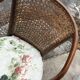 Vintage brown armchair in floral fabric and mahogany wood, 1950s, low back.