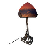 Contemporary mushroom lamp, wrought iron base and orange glass shell with blue hues in the art deco style