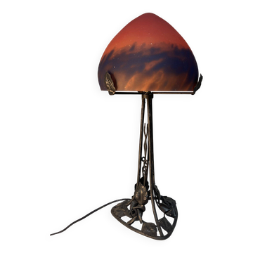 Contemporary mushroom lamp, wrought iron base and orange glass shell with blue hues in the art deco style