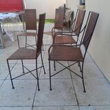 3 chaises et 2 fauteuils en fer forgé et rotin canné, années 50