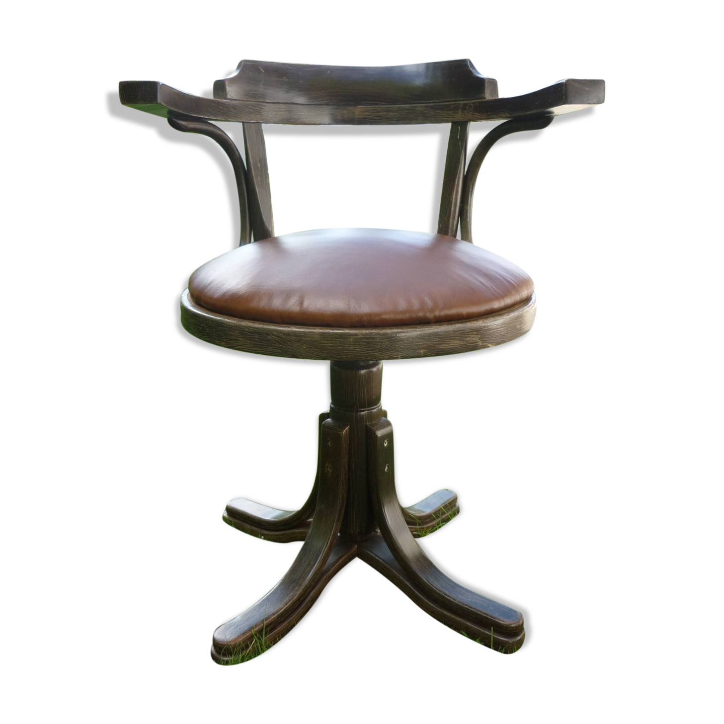 Swivel leather armchair