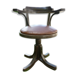 Swivel leather armchair