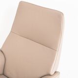 Leather armchair with footstool. Lotus model. Manufacturer: Kebe. Denmark