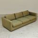Pierre Frey modernist bench in green and gold patterned fabric