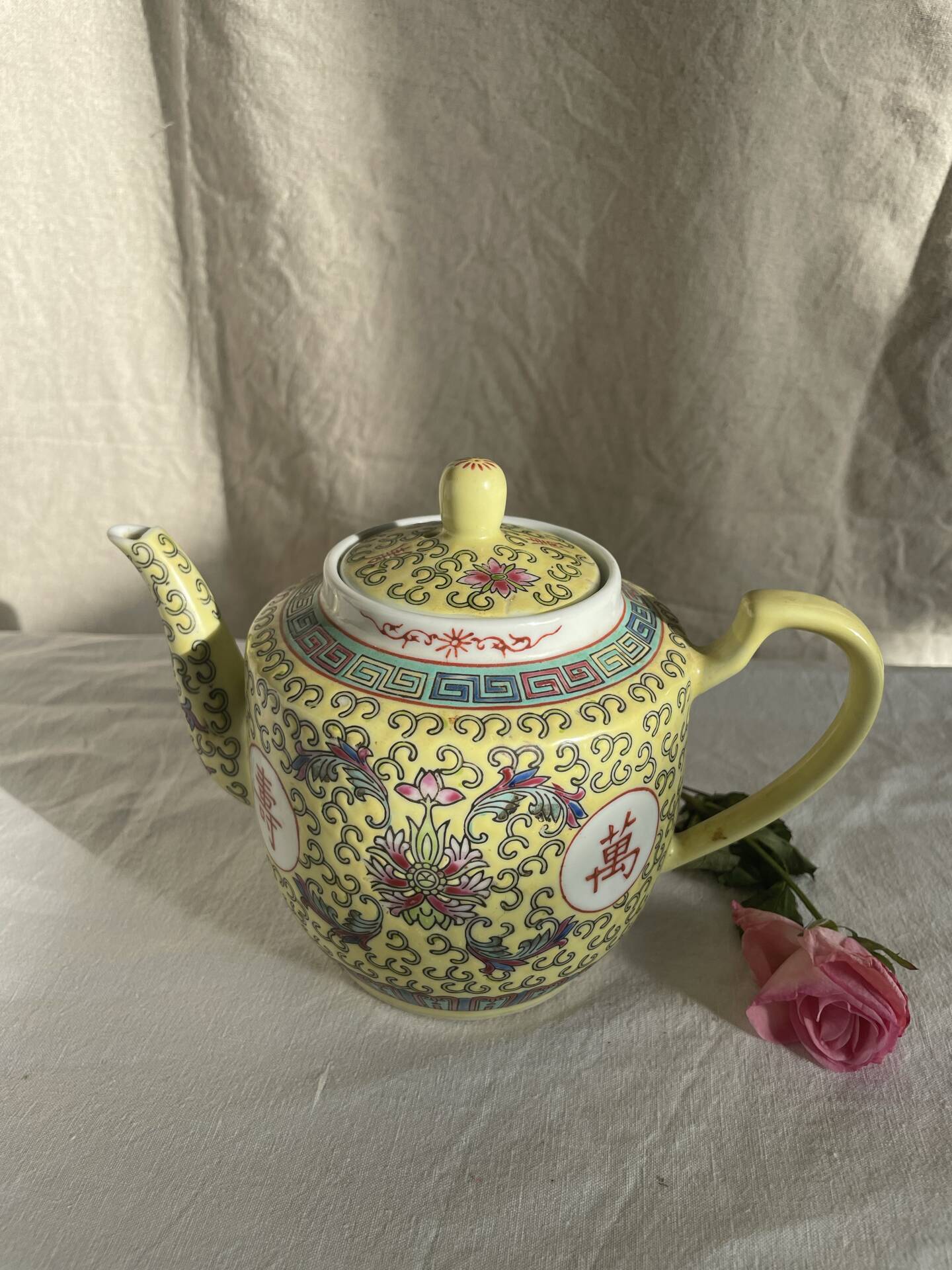 Chinese porcelain teapot with floral pattern