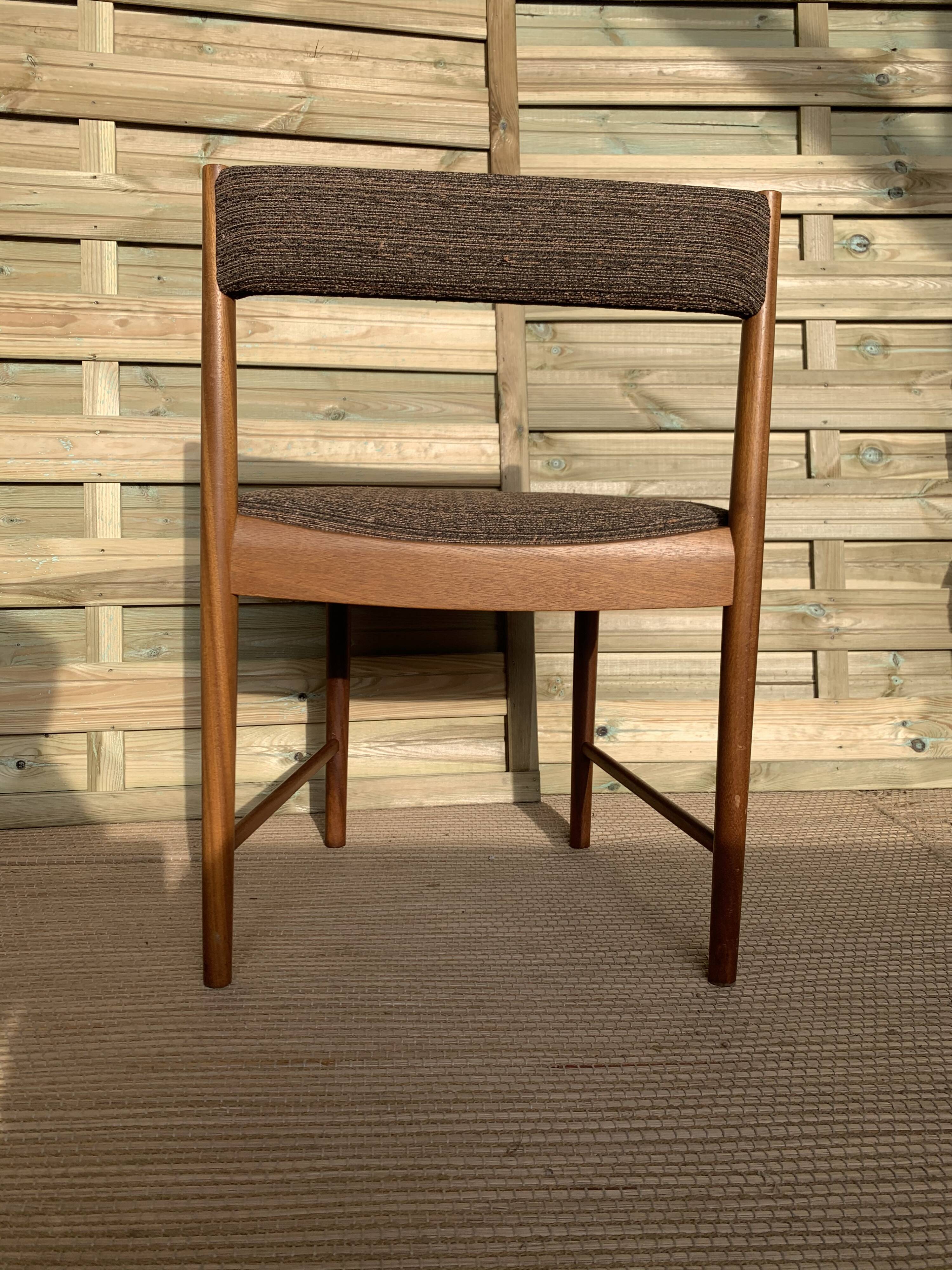 4 Scandinavian chairs made of teak and fabrics