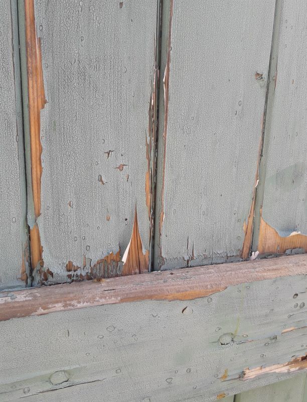 Pair of large wooden iron hanging shutters