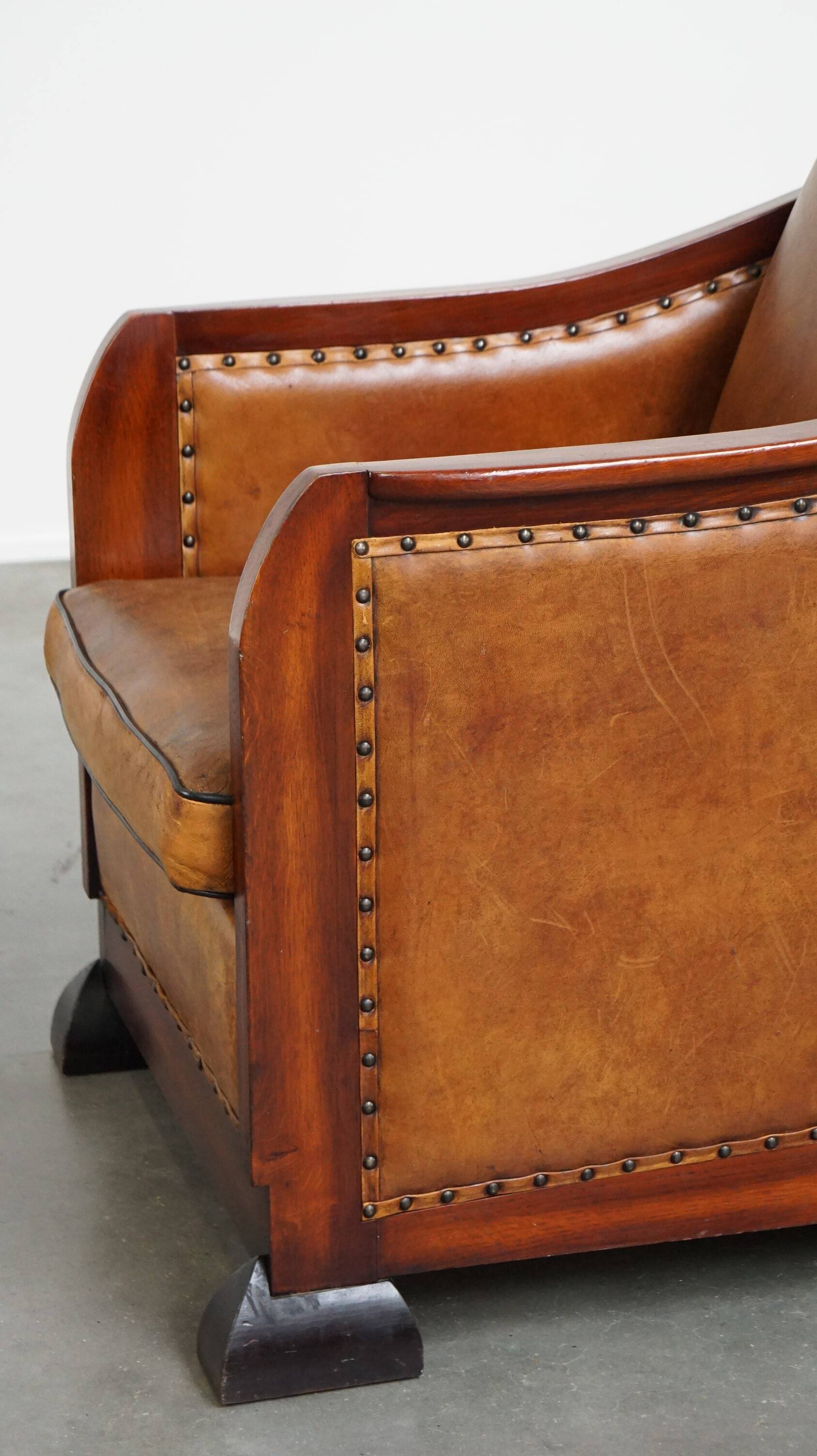 Unique, stately, comfortable sheepskin Art Deco design armchair