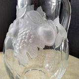 Large water jug with embossed fruit decoration in frosted glass