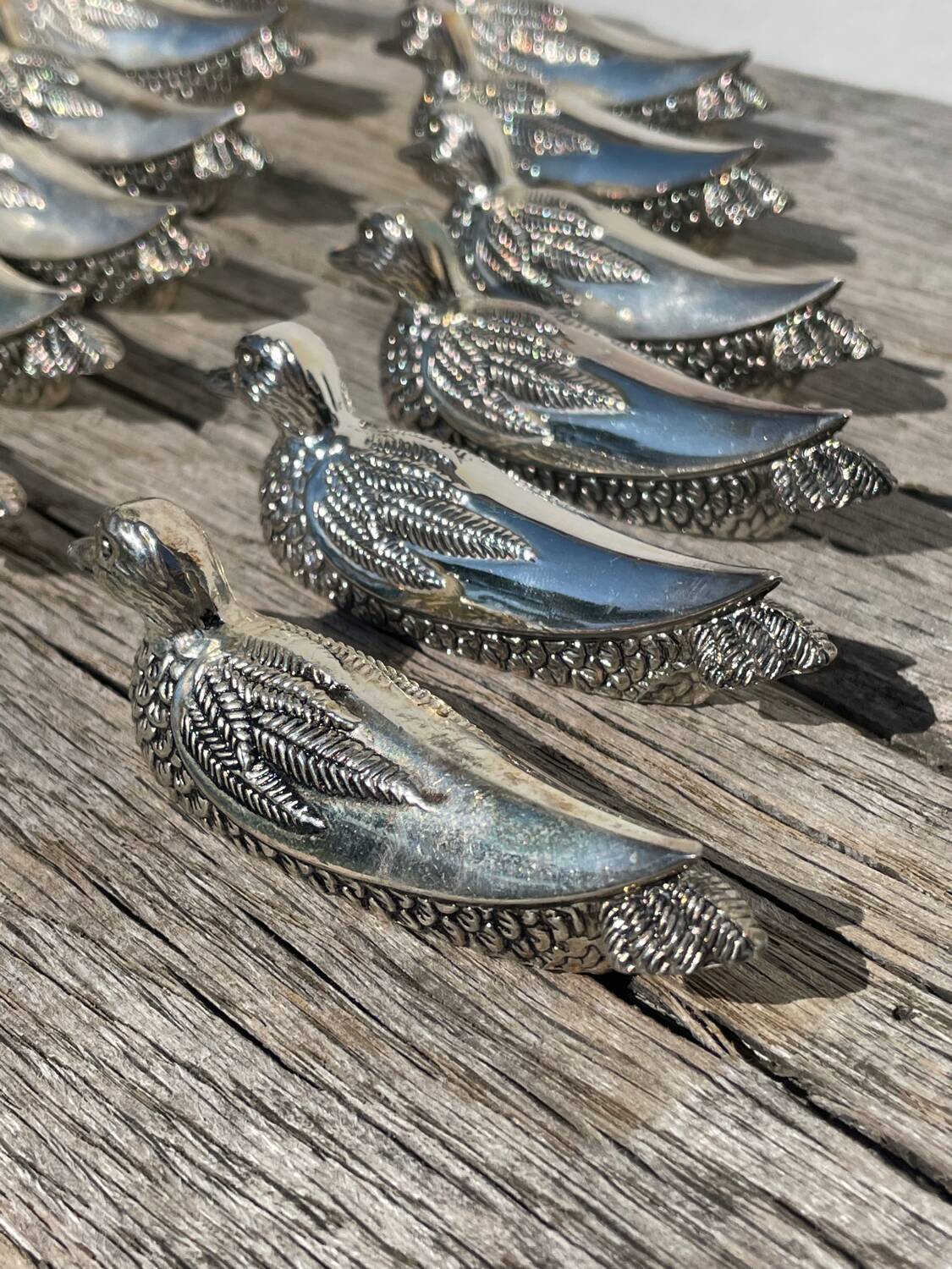 12 silver metal duck knife rests