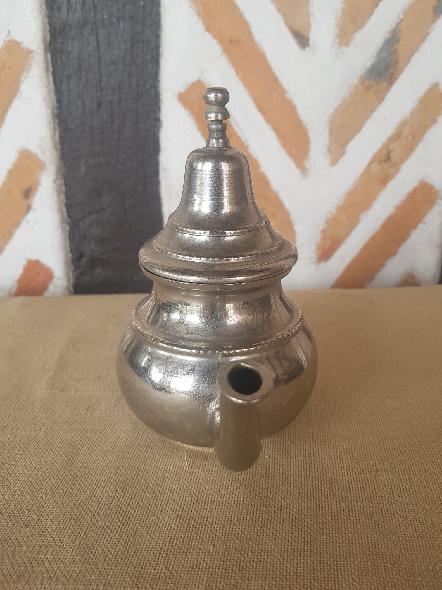 Oriental teapot silver metal