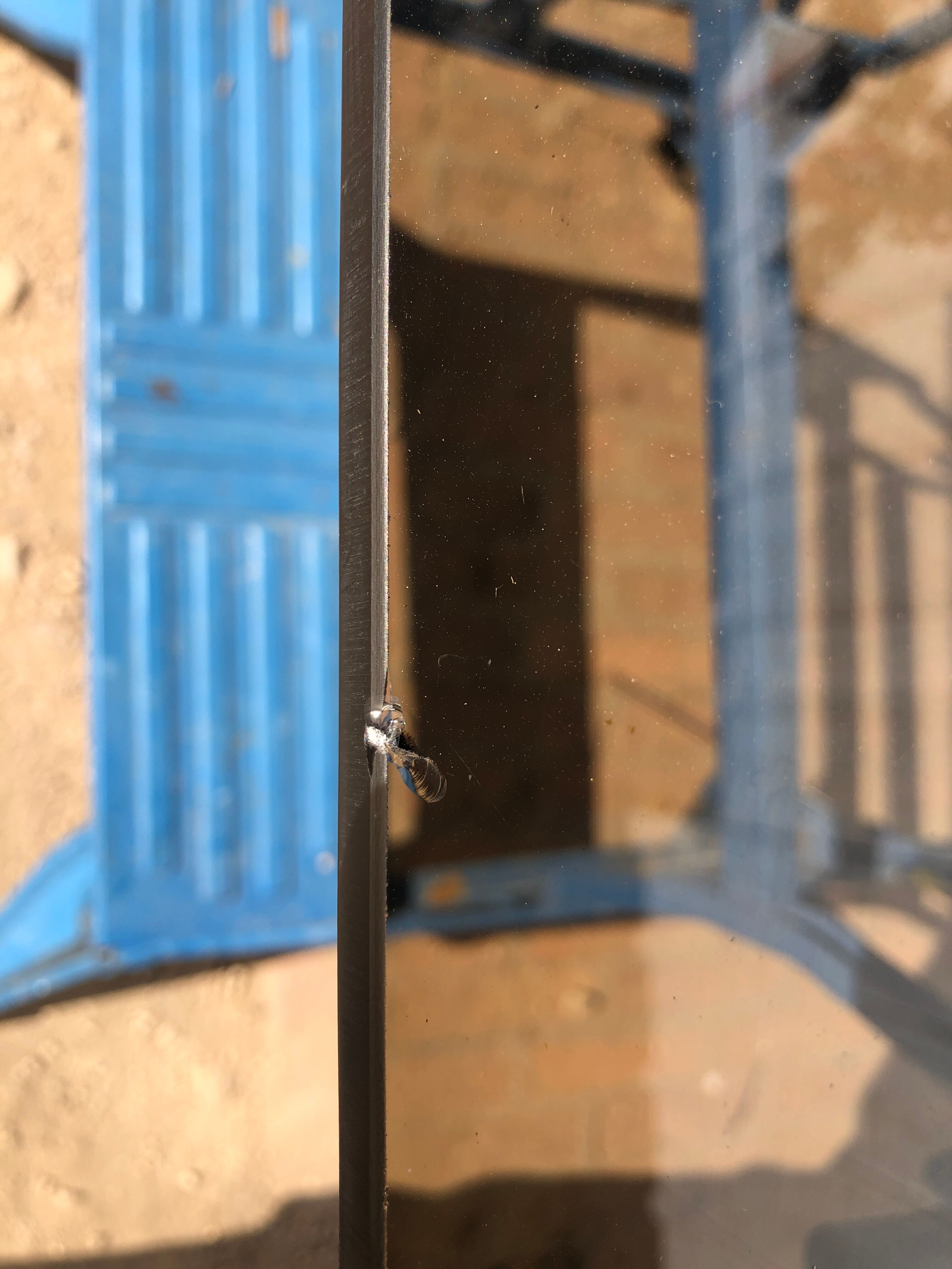 Glass and chrome metal dining table