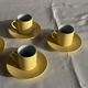 Set of 4 vintage yellow Italian espresso cups and saucers.