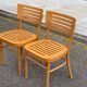 2 Scandinavian bistro chairs from Ikea, Balser, made of curved solid wood, 1999.