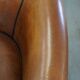 Set of 2 club armchairs in sheepskin leather with black piping