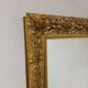 Grand miroir mural vintage sculpté et doré 1970
