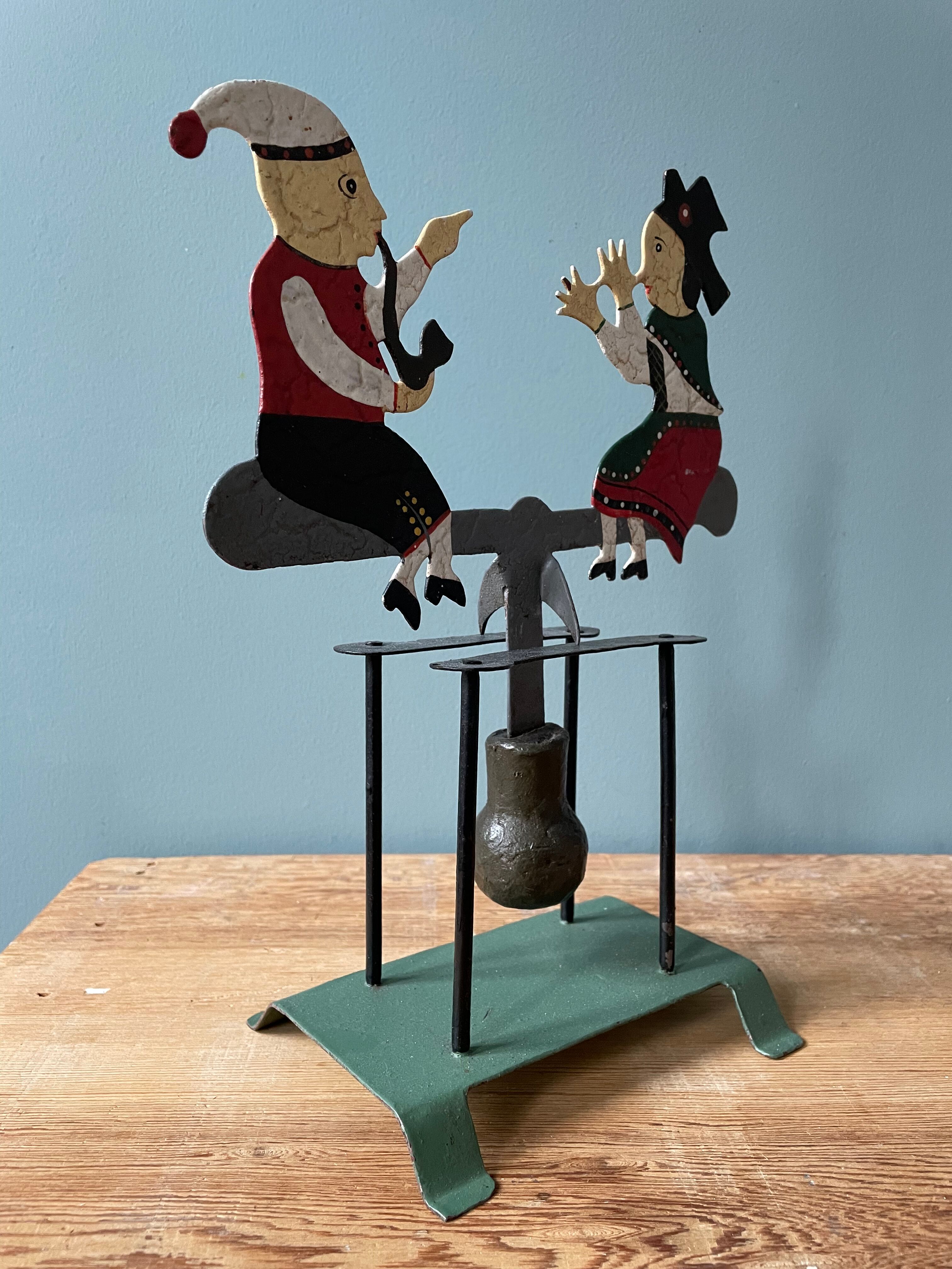 Old mobile toy with pendulum