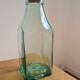 Green blown glass bottle