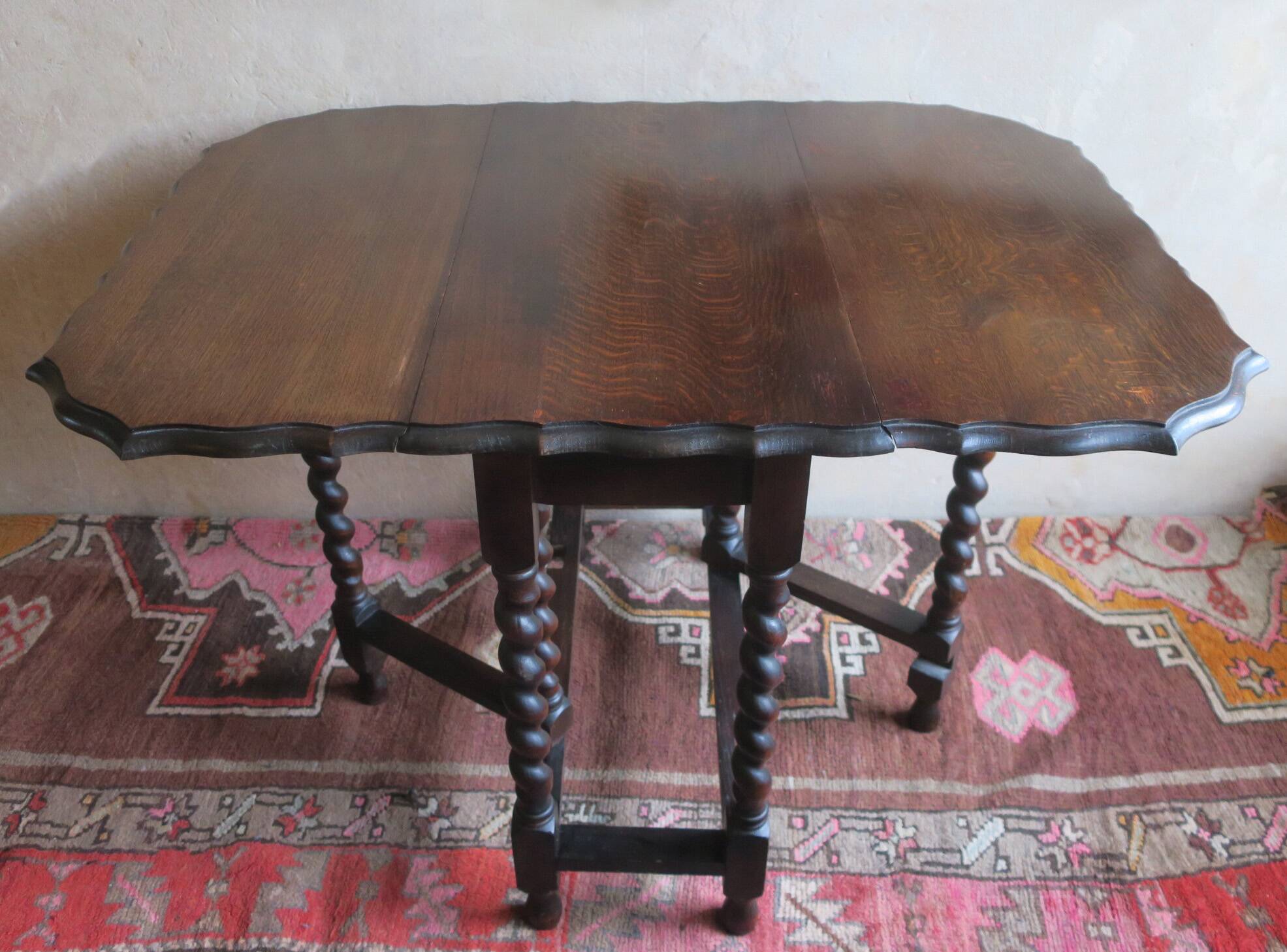 Farmhouse patinated extendable dining table in oak with carved edge, 1900