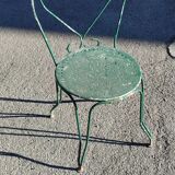 Garden table, two armchairs and a metal chair