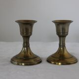 Small golden metal candle holders