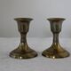 Small golden metal candle holders