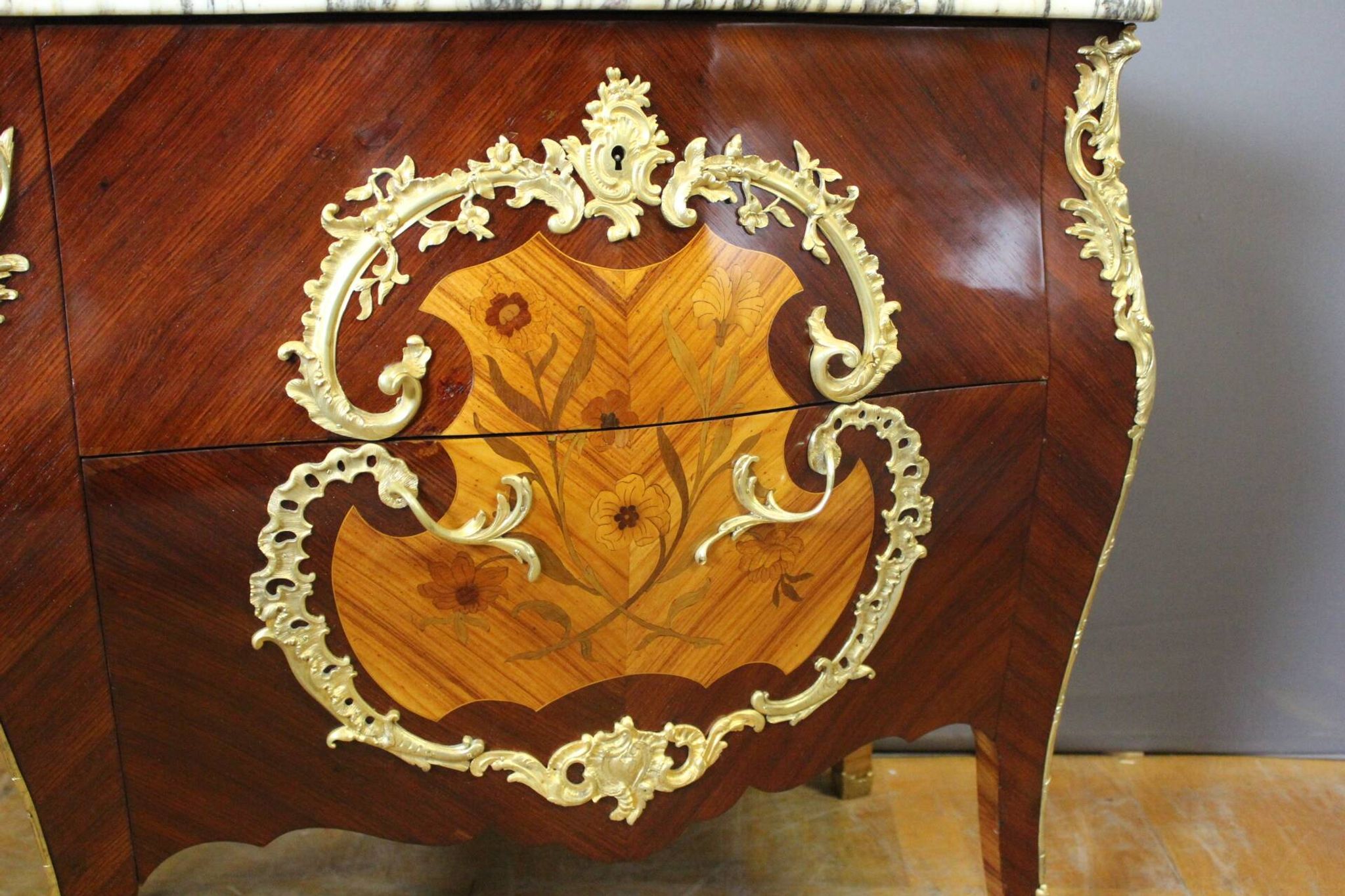 Louis XV style commode in marquetry around 1900