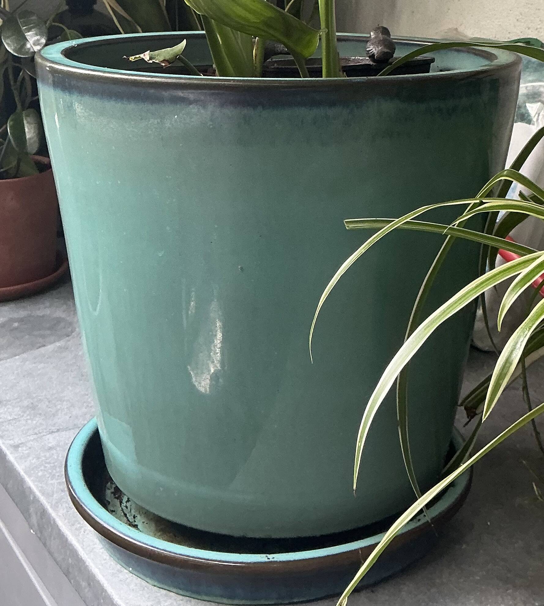Set of 3 large blue glazed stoneware pots.