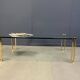 Peter Ghyczy style coffee table in brass and glass