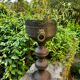 Large brass lion planter on a stand in Baroque Art Nouveau style.