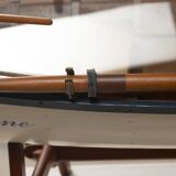 Boat-shaped coffee table reimagined with a glass top, contemporary design (after 2000)