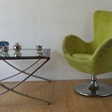 Bucket seat in chrome and green.