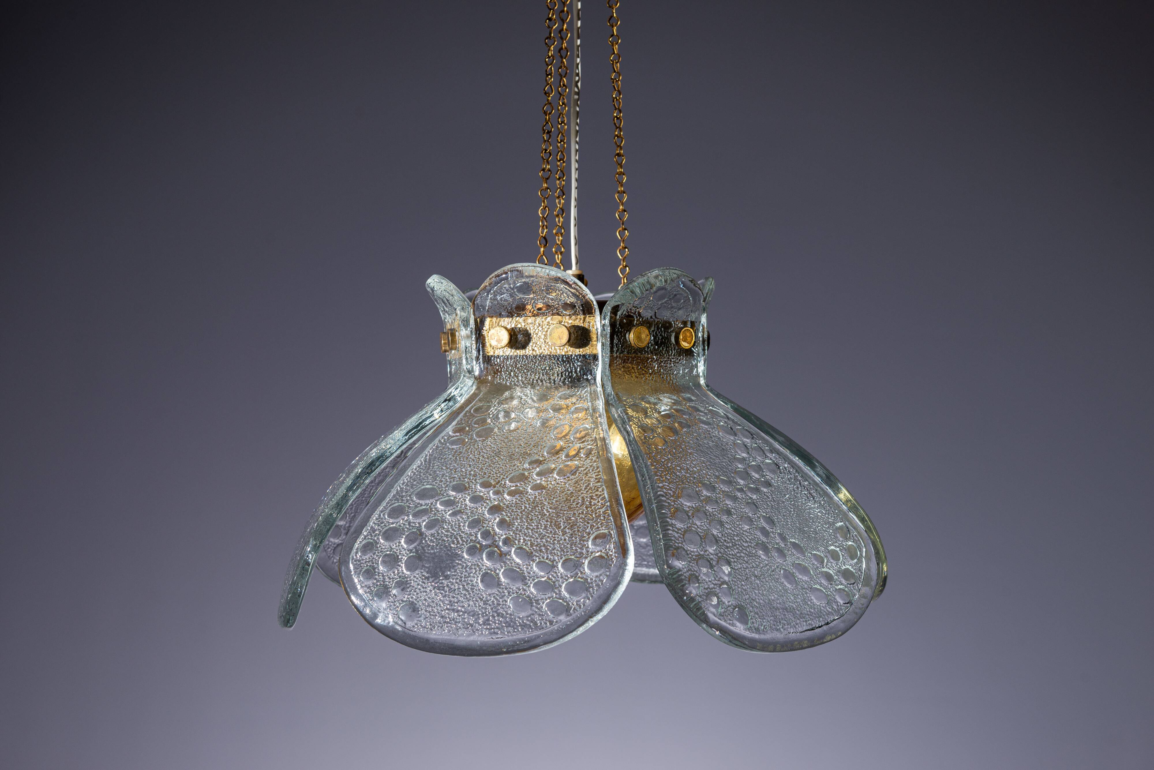 Swedish pendant with glass leaf shades and a center shade of amber coloured