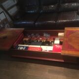 Coffee table with oak bottle and glass storage
