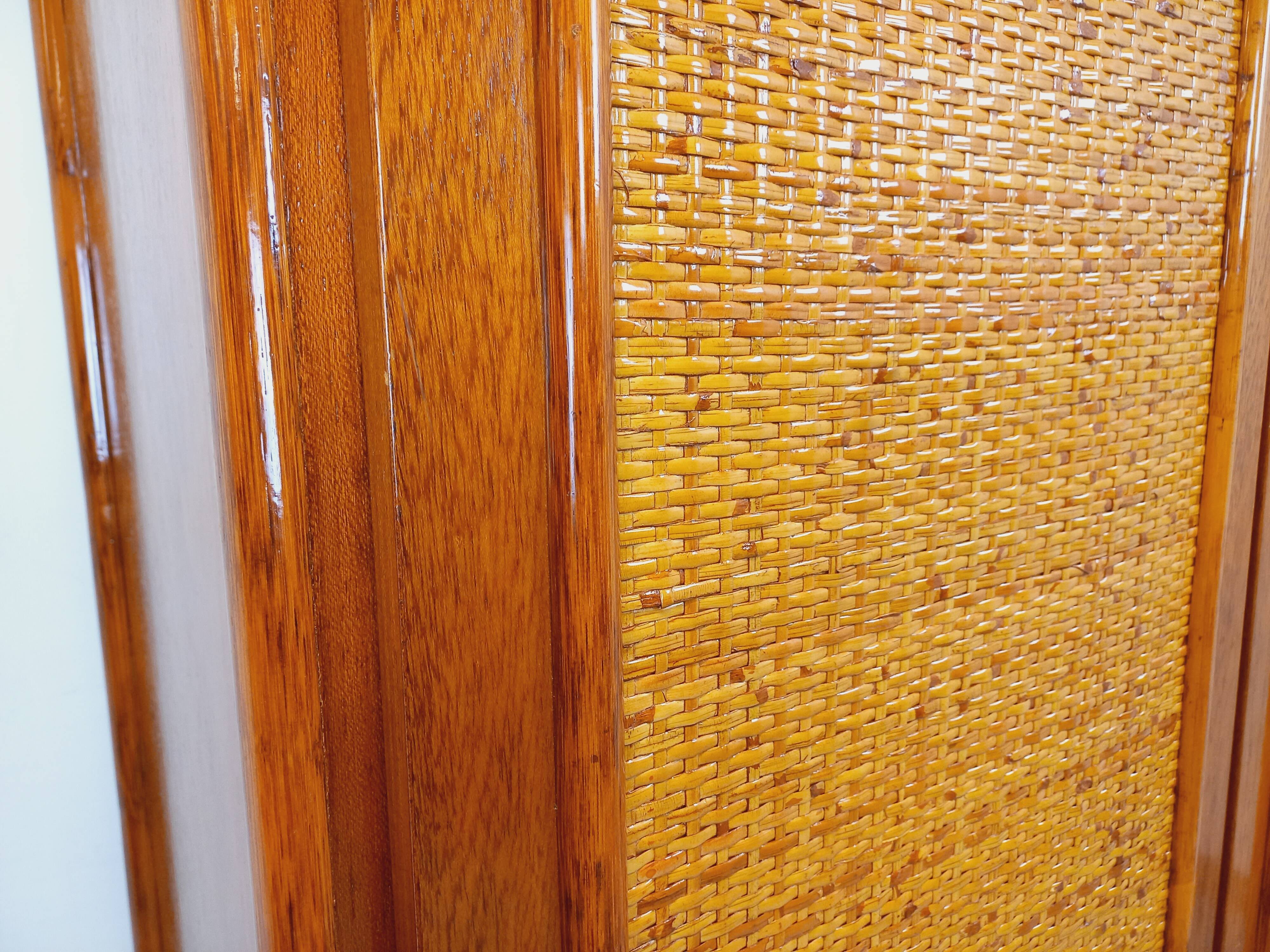 Vintage woven rattan and wood armoire by Maugrion for Roche-Bobois.
