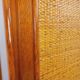 Vintage woven rattan and wood armoire by Maugrion for Roche-Bobois.