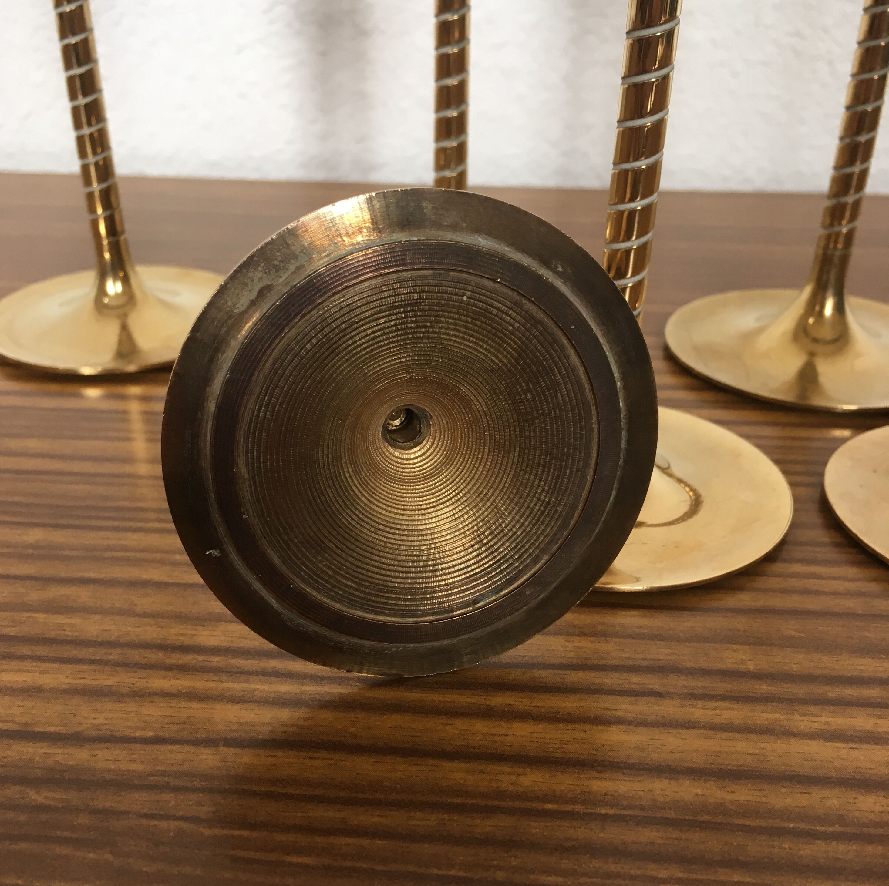 Series of 7 Scandinavian brass candlesticks