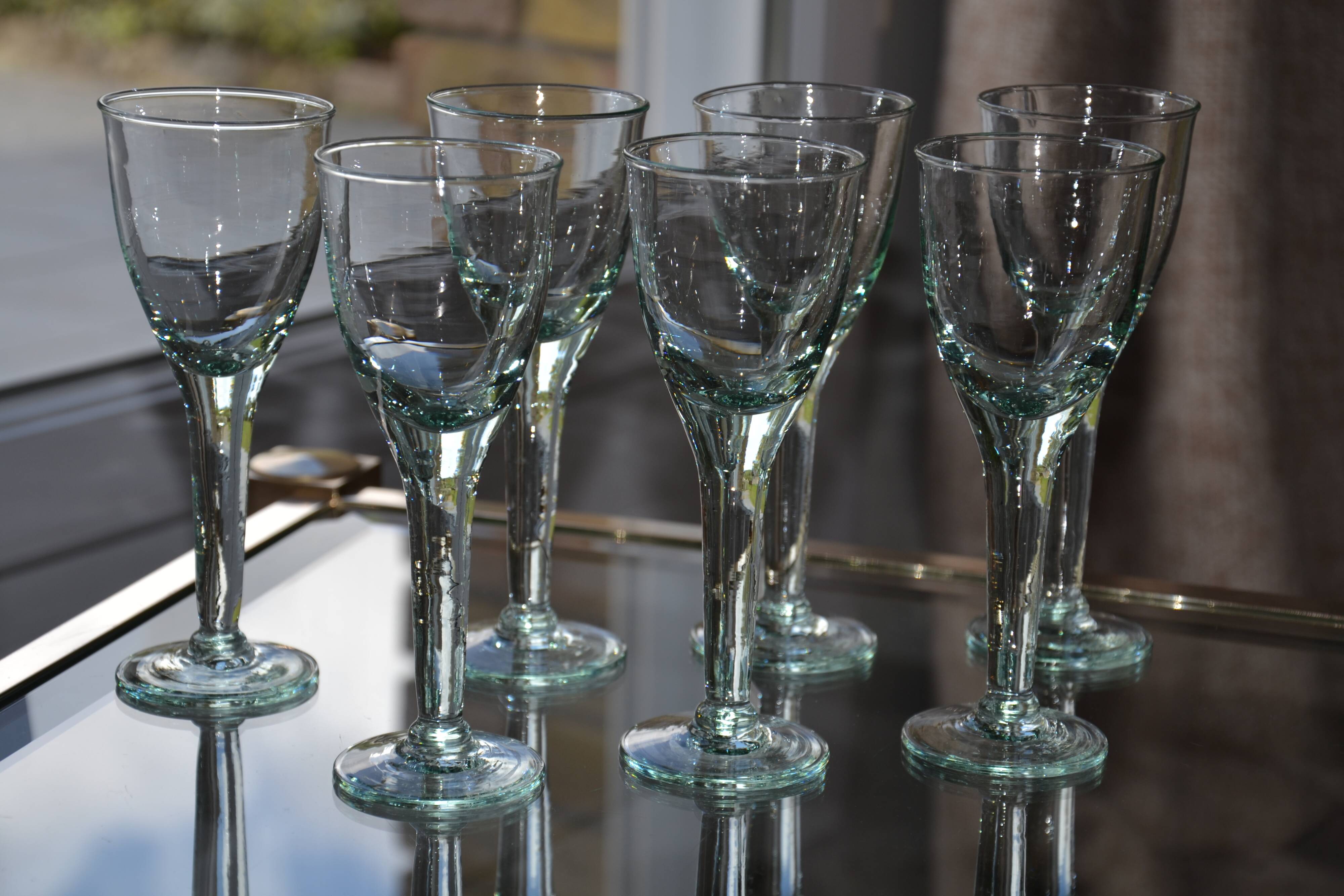 Set of hand-blown stemmed bubble glasses