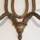 Golden Wrought Iron Wall Light with Oval Shield and Two Arms. French Work.