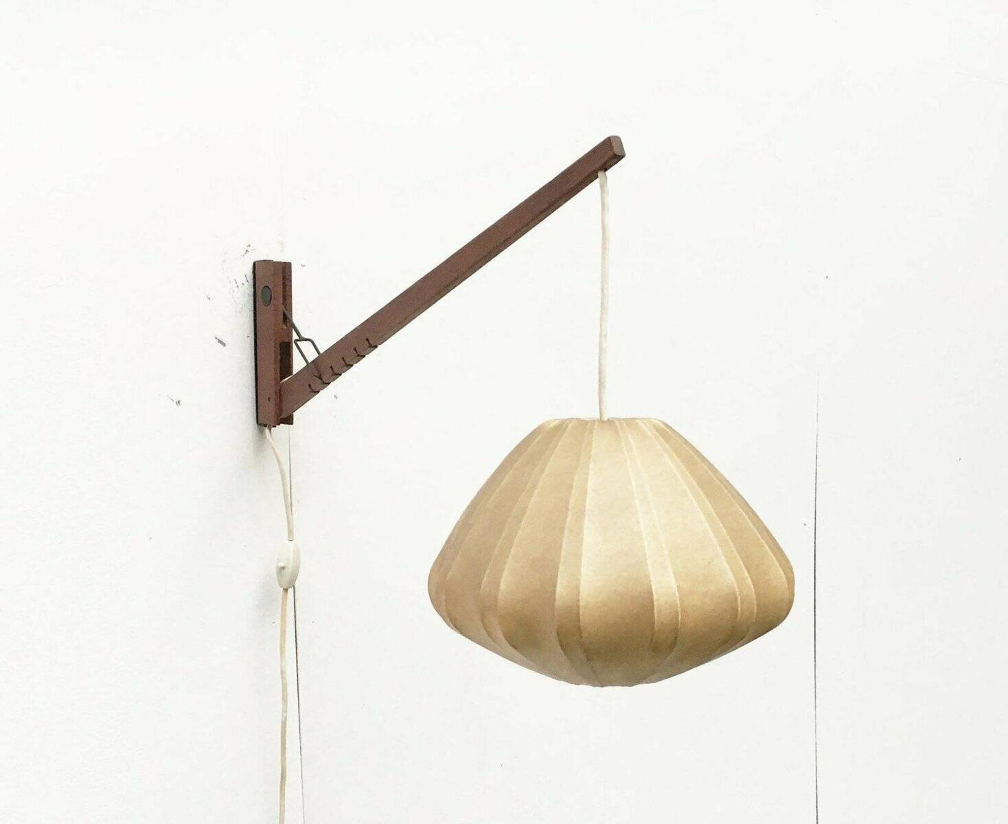 Mid-century pivoting wall lamp with a swing arm, Cocoon, made of teak wood, 1960s.