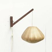 Mid-century pivoting wall lamp with a swing arm, Cocoon, made of teak wood, 1960s.