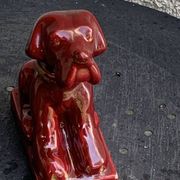 Dog sign CAB in vintage burgundy red enameled ceramic slip, art deco