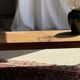 Brown Indonesian teak coffee table, with a border and cylindrical legs H40 L103.