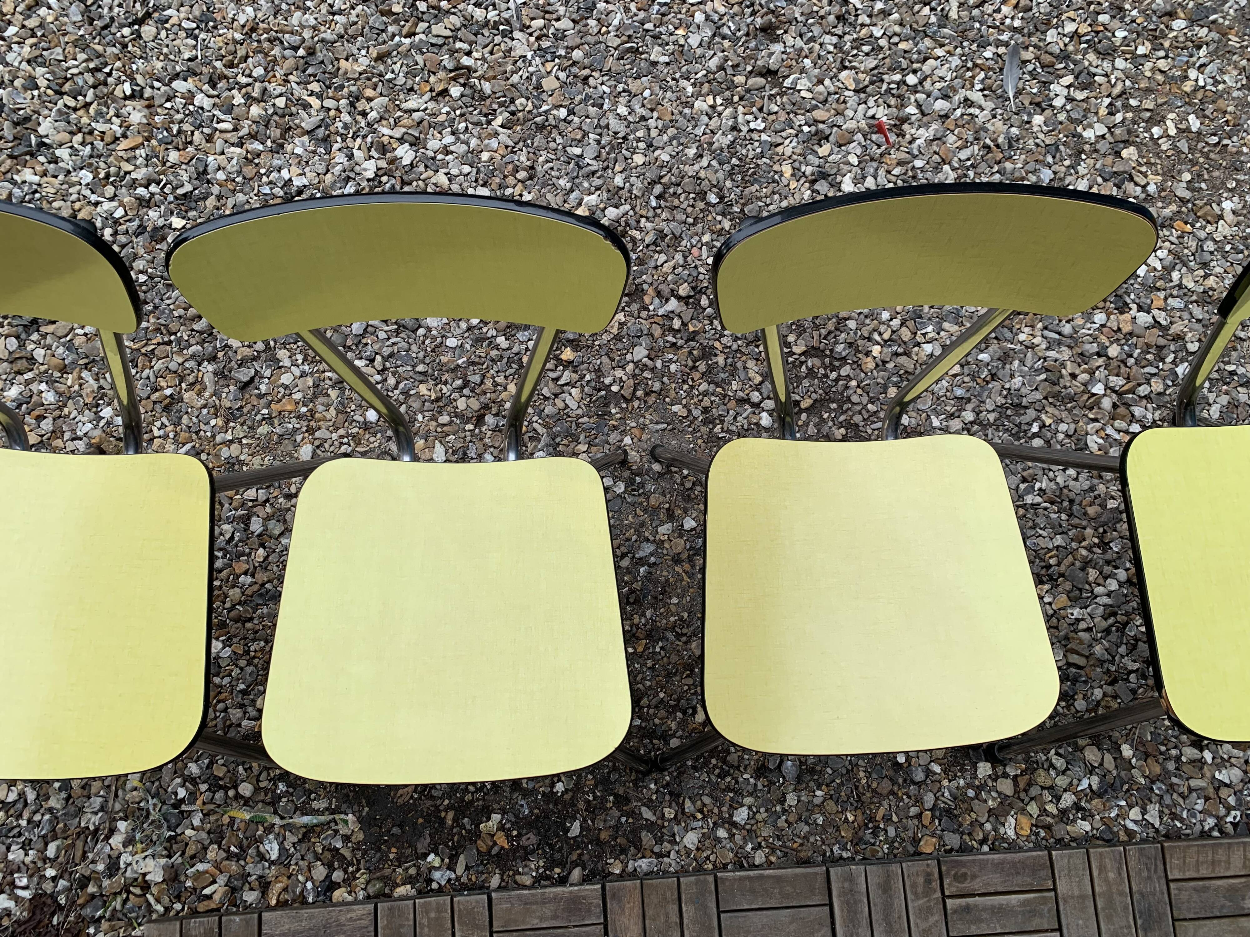 Yellow Formica chairs with compass legs, 1950s
