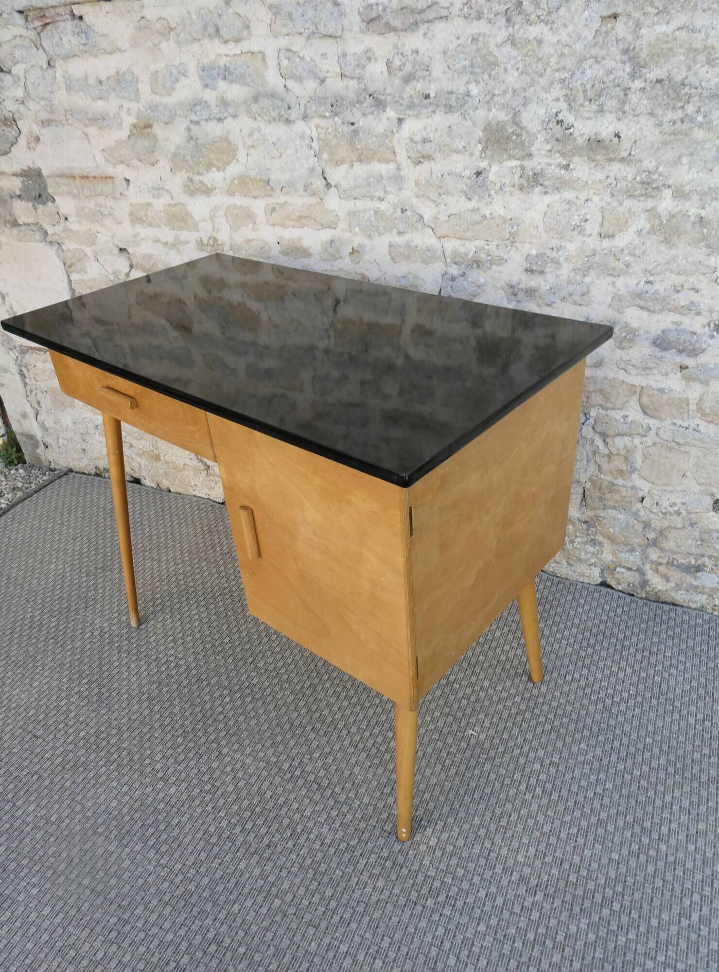 Baumann desk in light wood and black Formica, around 1960.